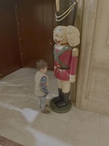 Child Meets Large Nutcracker Holiday Display