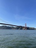 Golden Gate Bridge shining bright over San Francisco Bay