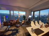Penthouse Living Room with a City View