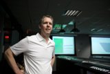 Tech-Savvy Man at Mission Control