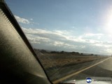 Highway drive through the snowy mountains
