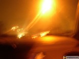 Blazing Car in the Night
