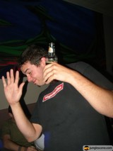 Man Enjoying a Bottle of Beer