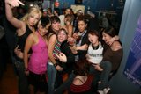 Party People Pose at Nightclub