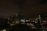 Nighttime Metropolis from a Rooftop