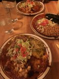 Three plates of delicious Mexican cuisine