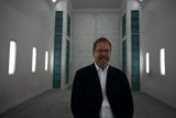 The Elegant Man in the Glass Corridor