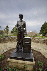 Bronze Statue Commemorating Television Pioneer with Vintage TV Set