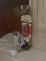 Toddler Discovers Giant Nutcracker Christmas Decoration
