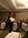 Keynote Speech in a Reception Room