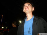 Blue Shirted Man in the Night Sky