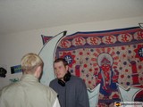 Two Men Contemplating Artwork