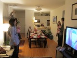 Family Gathers for Hanukkah Dinner Party Celebration
