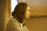Portrait of a Glasses-Wearing Man with Long Hair at DEFCON 17