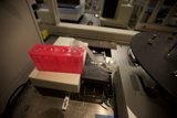 Red Container Machine in a Laboratory