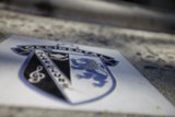 Symbolic Emblem on Sidewalk