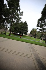 Child Running Through Park on Overcast Day