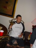 Man in Black T-Shirt Relaxing on a Armchair