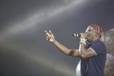 Red-Haired Singer Takes the Stage with Mic
