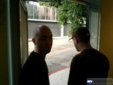 Two Men at the Urban Doorway