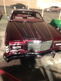Maroon Coupe Parked in Vintage Car Show