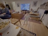 Family Evening at Home with Child Playing
