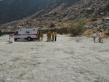 Emergency Response Team Standing by Ambulance