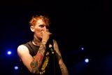 Tattooed Singer Rocks the Concert