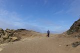Man Taking a Hike in the Desert