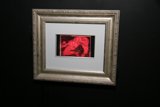 Red and Black Abstract Painting in a Frame