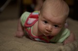 Curious Baby During Tummy Time on Carpet