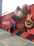 Standing next to Santa
