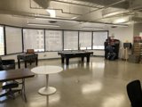 A Game of Pool in the School Billiard Room