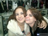 Women strike a pose in trendy store