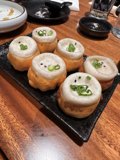Delightful Pastries on Black Plate