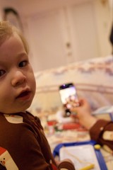 Young Child Playing with Drawing Toy on Christmas