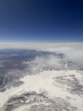 Space's View of Snow-Capped Peaks