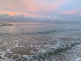 “Radiant Sunset at Royal-Moana Beach”