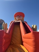 Giant Inflatable Clown Slide at Outdoor Event