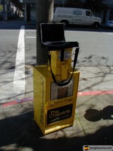 Laptop on a Yellow Box