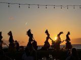 Silhouettes of Hula Dancers at Sunset on the Beach