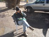 Spokes and Sitting: Man Contemplates Awaiting Adventure