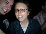 Smiling Duo With Stylish Glasses