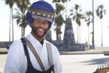 Turbaned Gentleman with Guitar and palm tree