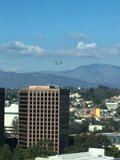Flying Over The City With Mountains