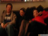 Three Happy People on a Cozy Couch