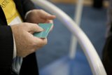 Blue Card in Hand