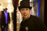 Hat-wearing Man at Art Walk