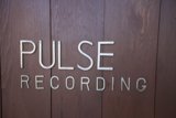 Pulse Recording Logo on Stained Wood Plaque