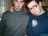 Two Men in Glasses Strike a Pose